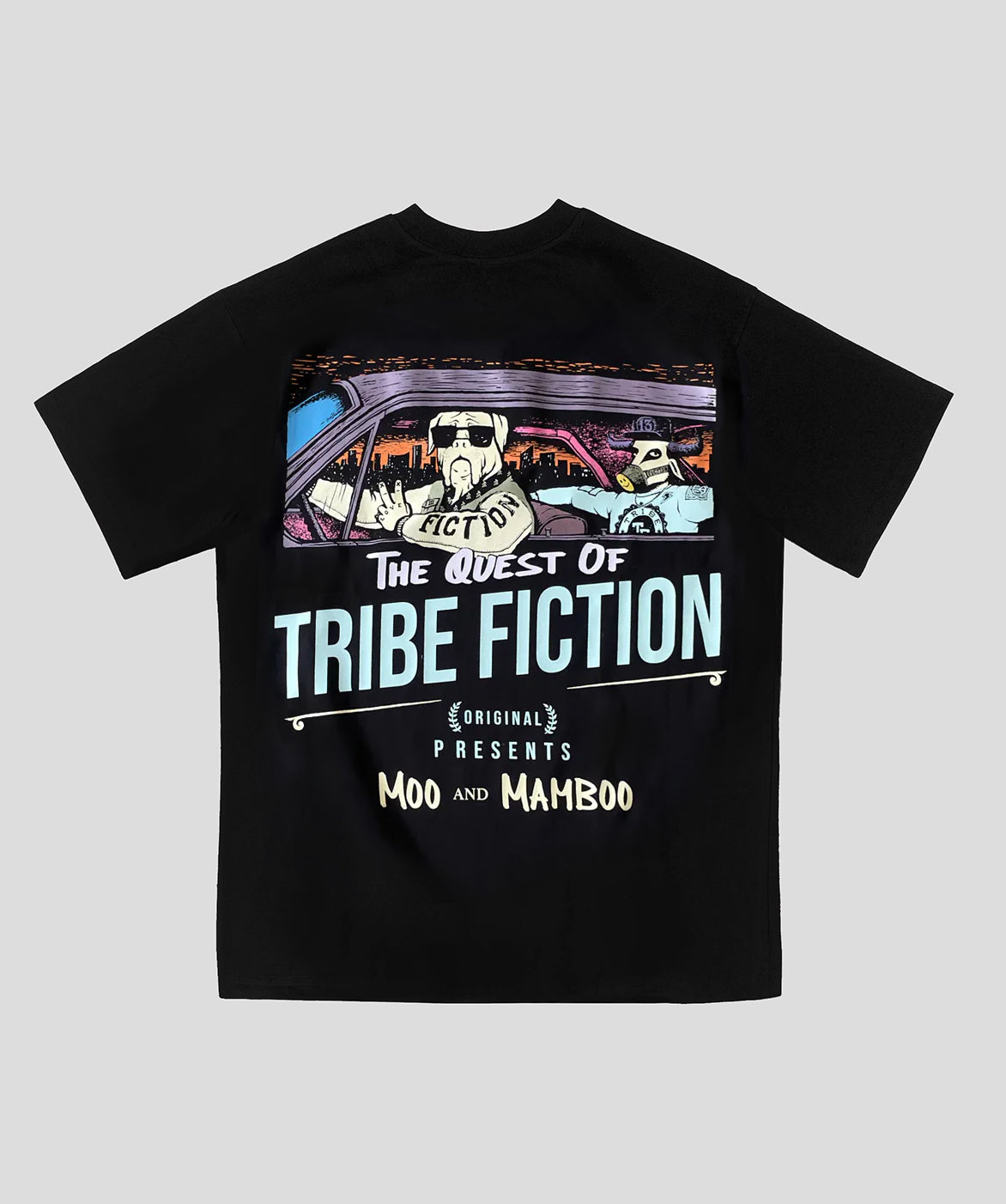 Tribe Fiction "Moo and Mamboo" black t-shirt featuring a bulldog and a cow in a car graphic design on a light gray background