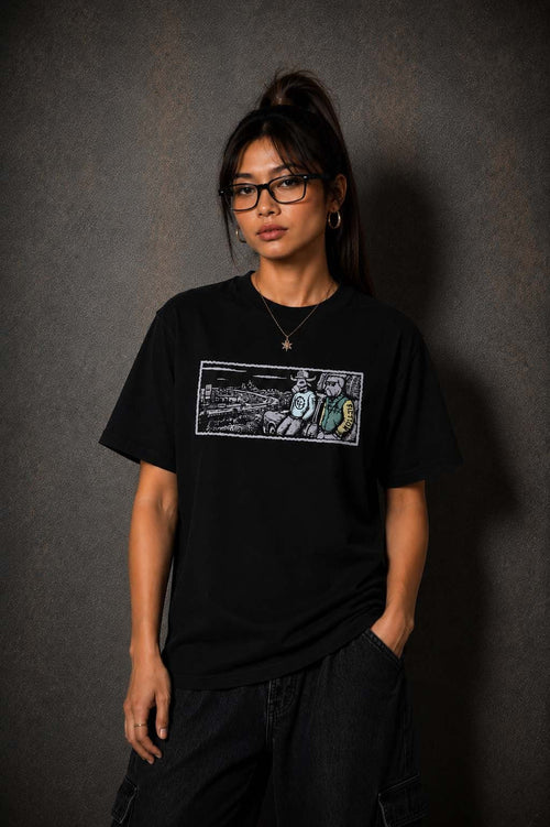 Model wearing the Moo and Mamboo 2 black t-shirt, front view