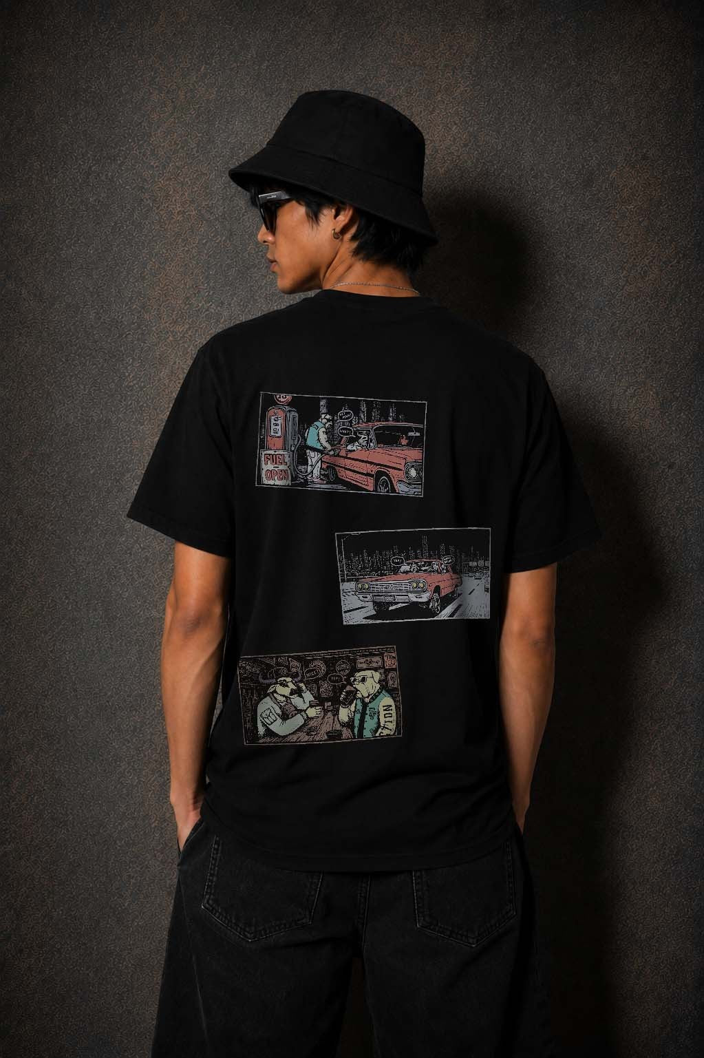 Model wearing the Moo and Mamboo 3 black t-shirt, back view showing the three-panel print