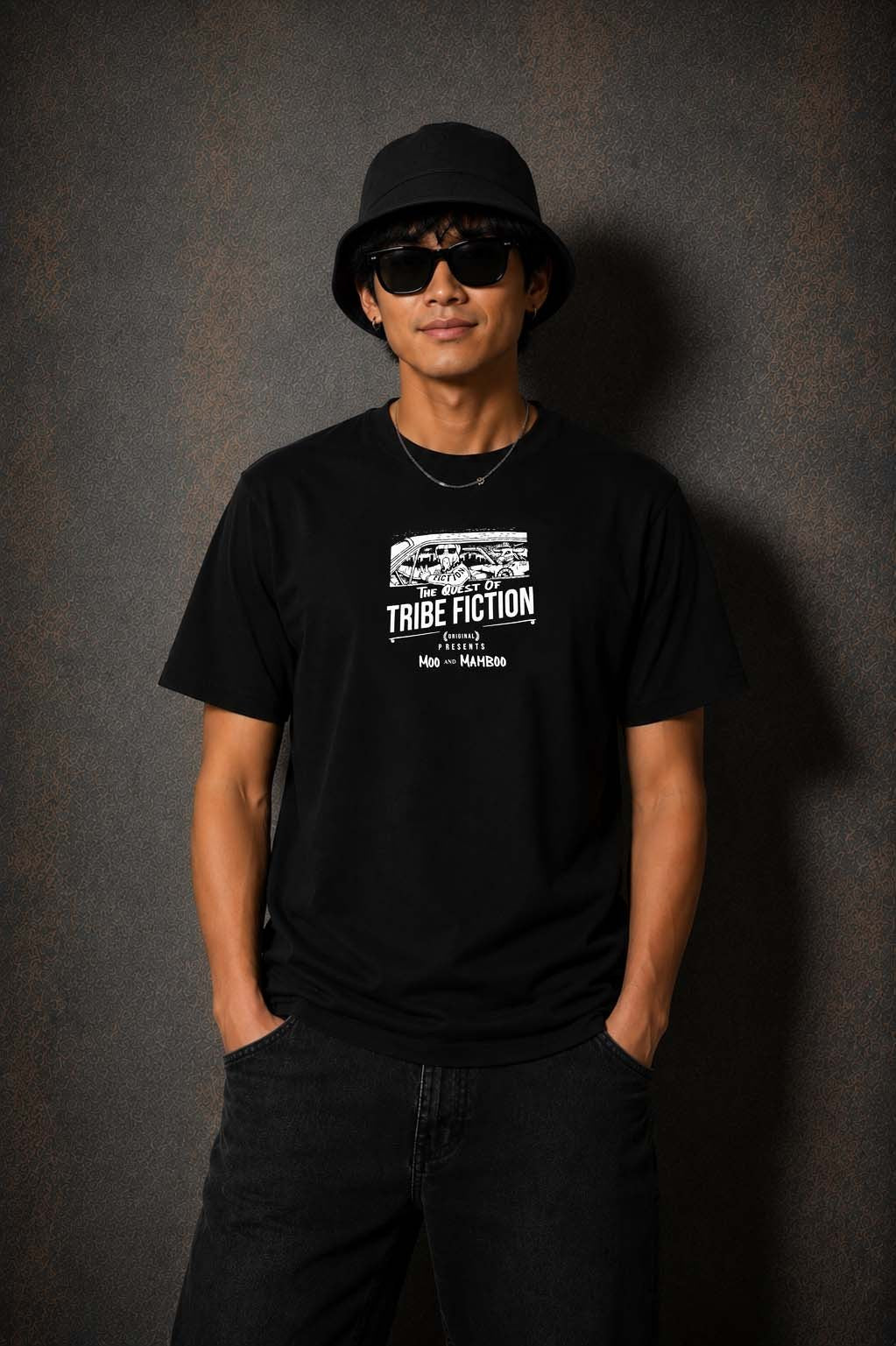 Model wearing the Moo and Mamboo 3 black t-shirt, front view