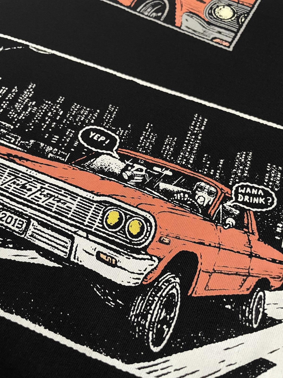 Close-up of the night street panel from the Moo and Mamboo 3 back print